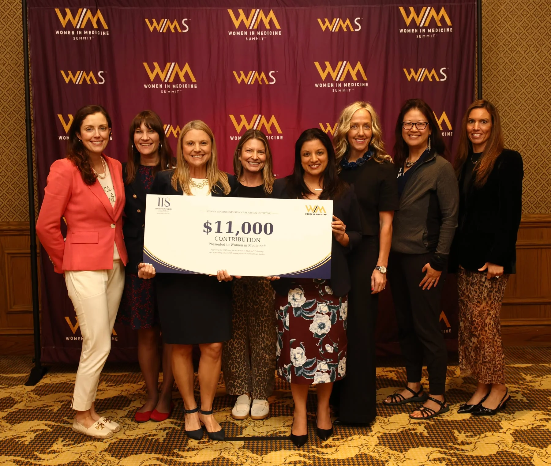 Women at the Women in Medicine Summit with an IIS $11,000 contribution presentation